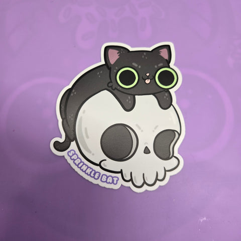 Cat on skull sticker 4" new